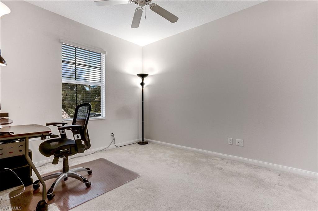 8334 Rimini Way Naples, FL 34114 - Photo 18 of 34 a view of a room with gym equipment