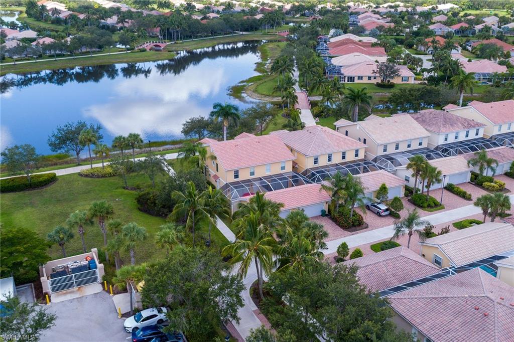 8334 Rimini Way Naples, FL 34114 - Photo 26 of 34 an aerial view of a houses with outdoor space and lake view