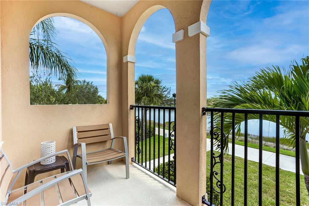 8334 Rimini Way Naples, FL 34114 - Photo 3 of 34 a view of balcony with two chairs and a table