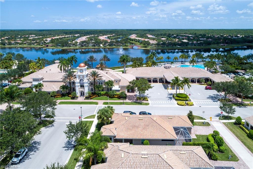 8334 Rimini Way Naples, FL 34114 - Photo 33 of 34 an aerial view of a house with a swimming pool yard and outdoor seating