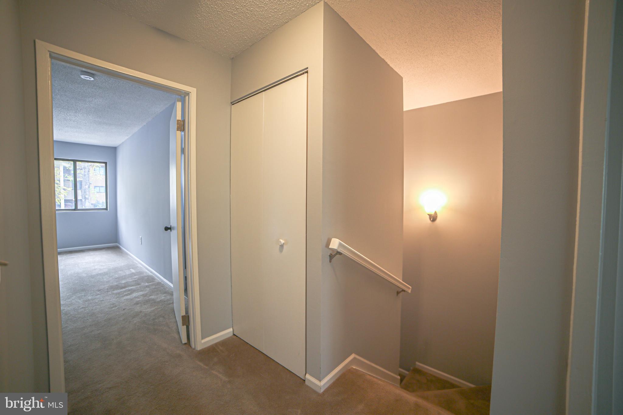 1818 Old Post Terrace Woodbridge, VA 22191 - Photo 22 of 33 Upstairs hall and linen closet