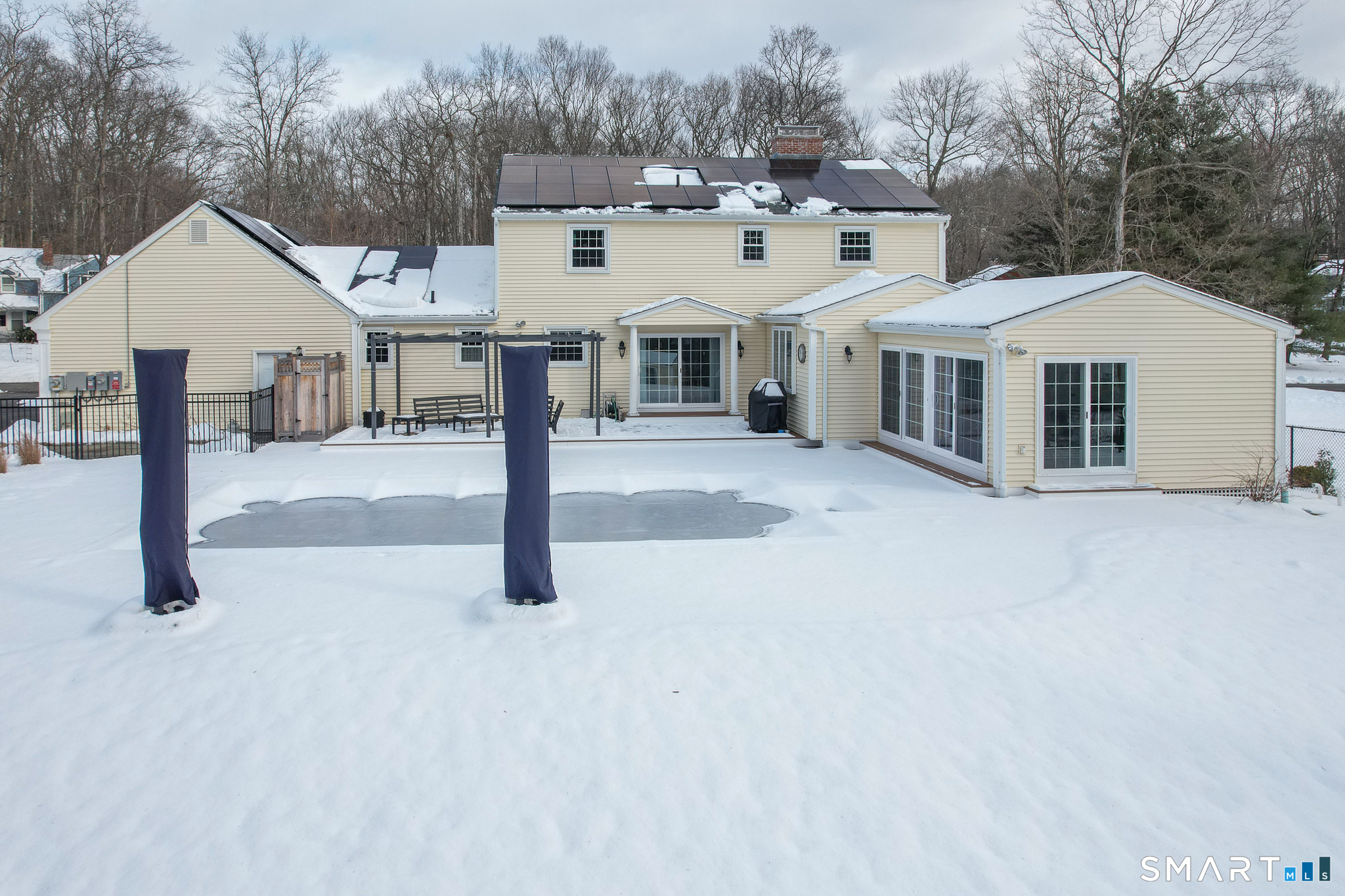 5 Crosswood Road Farmington, CT 06032 - Photo 35 of 40 a view of a white house next to a yard with road
