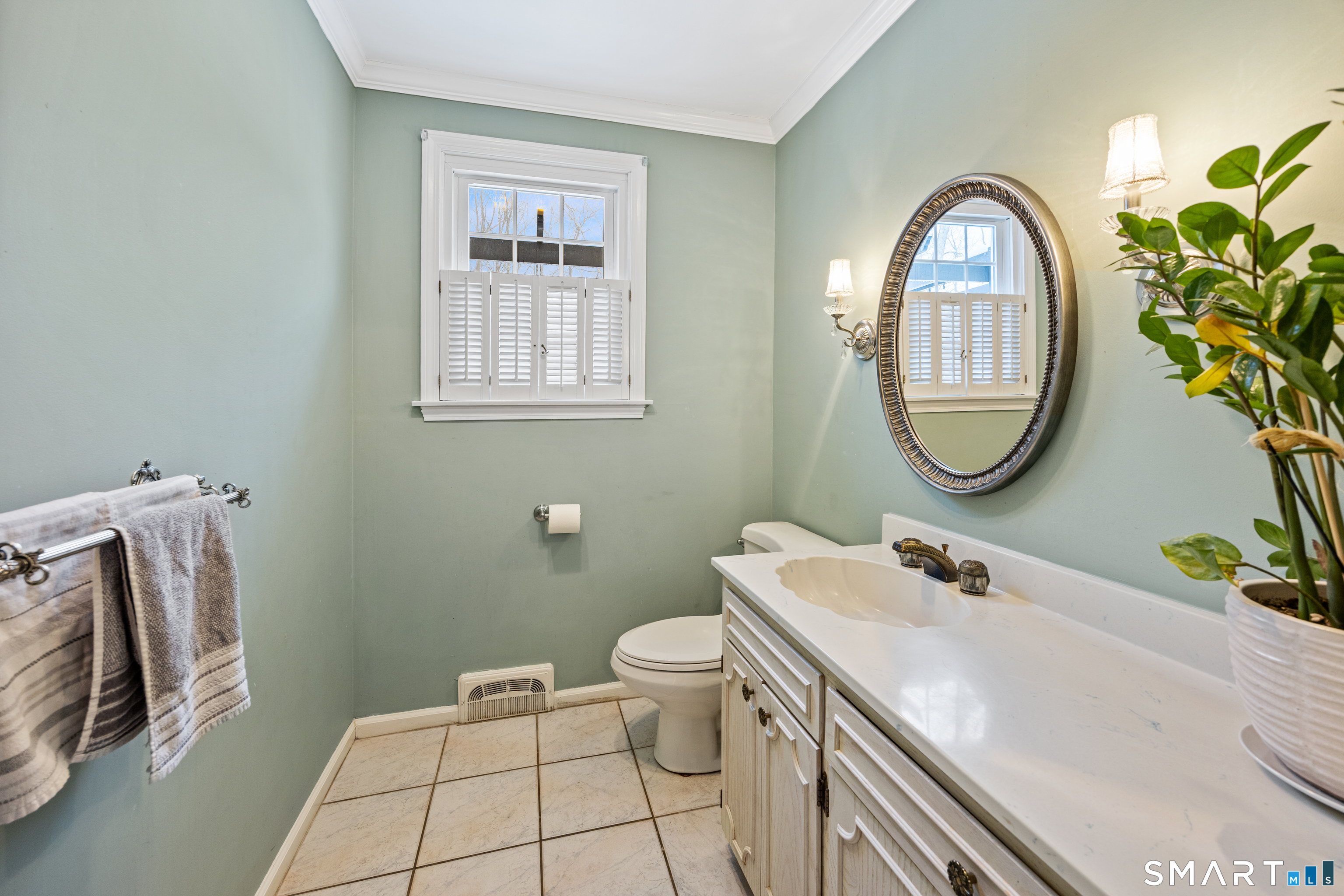 5 Crosswood Road Farmington, CT 06032 - Photo 5 of 40 a bathroom with a sink mirror and toilet