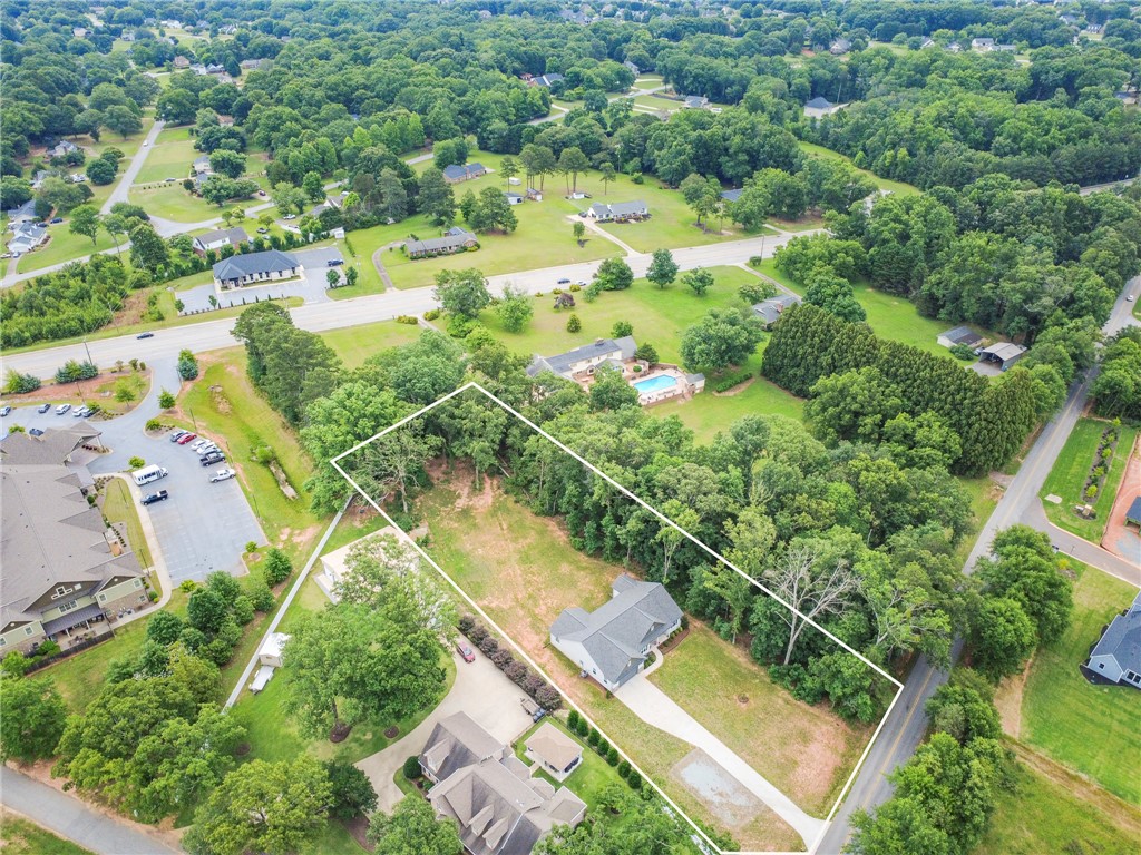 3080 McGee Road Iva, SC 29655 - Photo 44 of 49 An aerial perspective showcases a home nestled amidst verdant trees and a tranquil neighborhood.