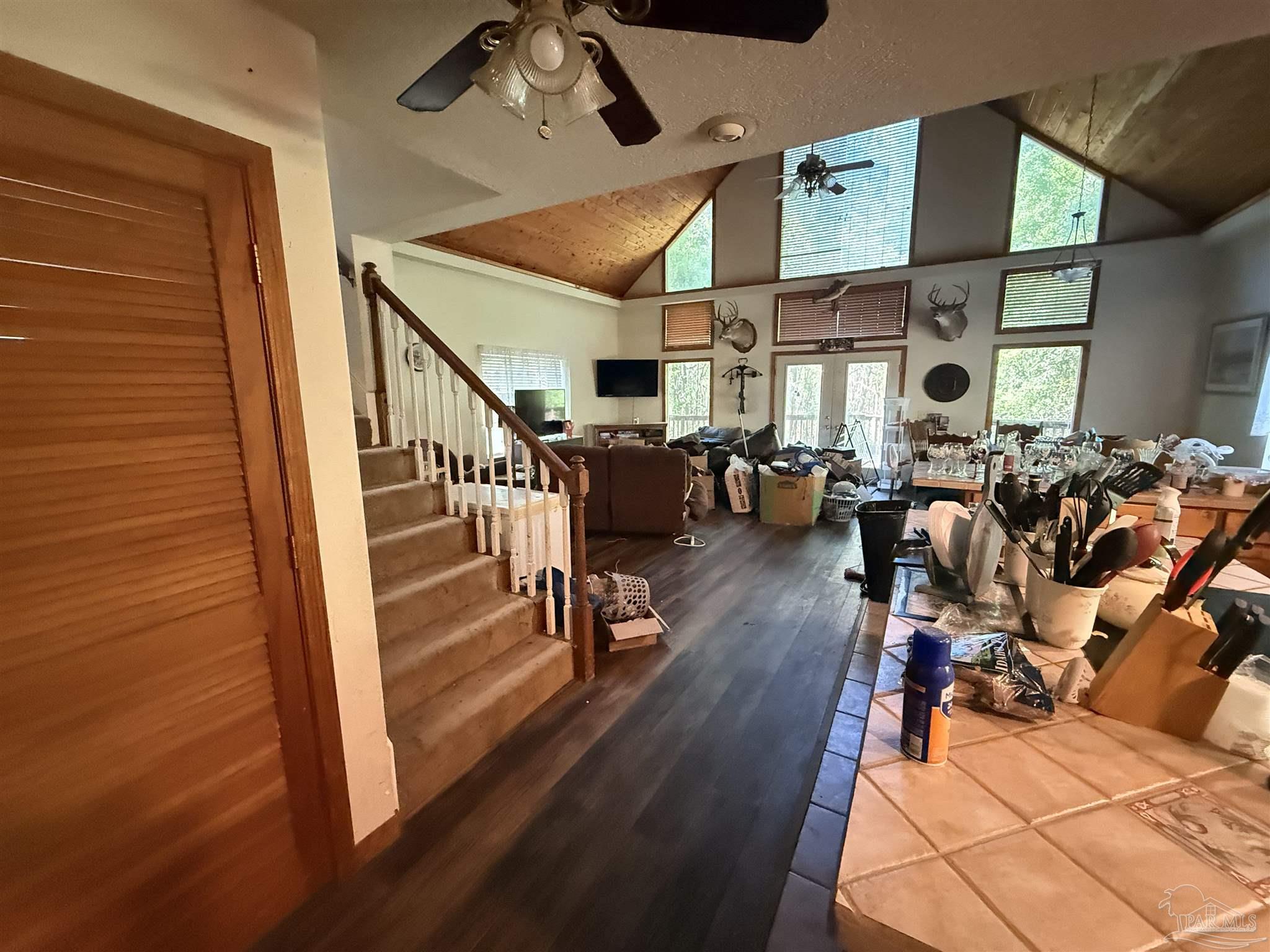 9543 Quiet Creek Road Milton, FL 32570 - Photo 19 of 45 a very nice looking living room with wooden floor