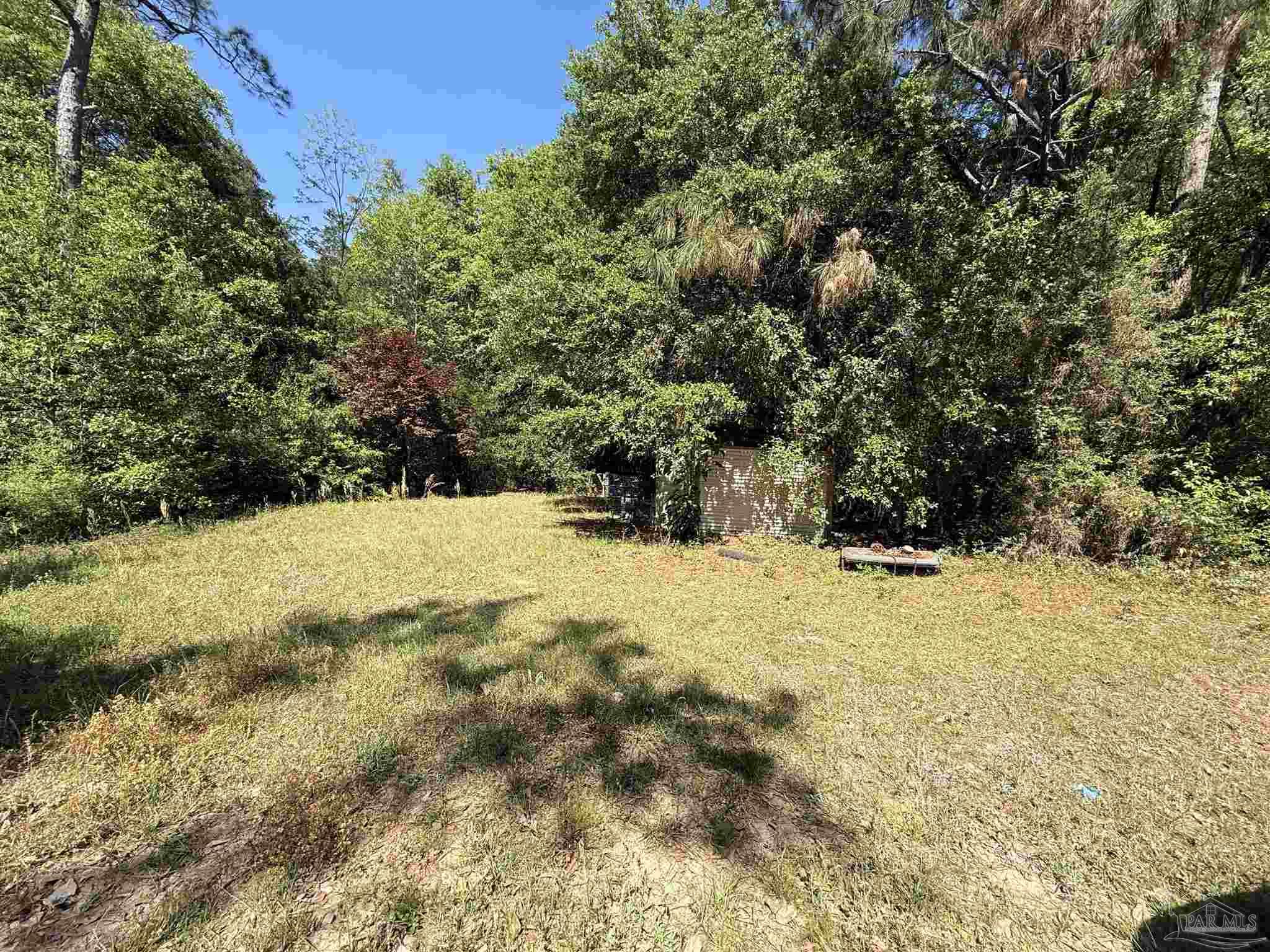 9543 Quiet Creek Road Milton, FL 32570 - Photo 6 of 45 a view of back yard