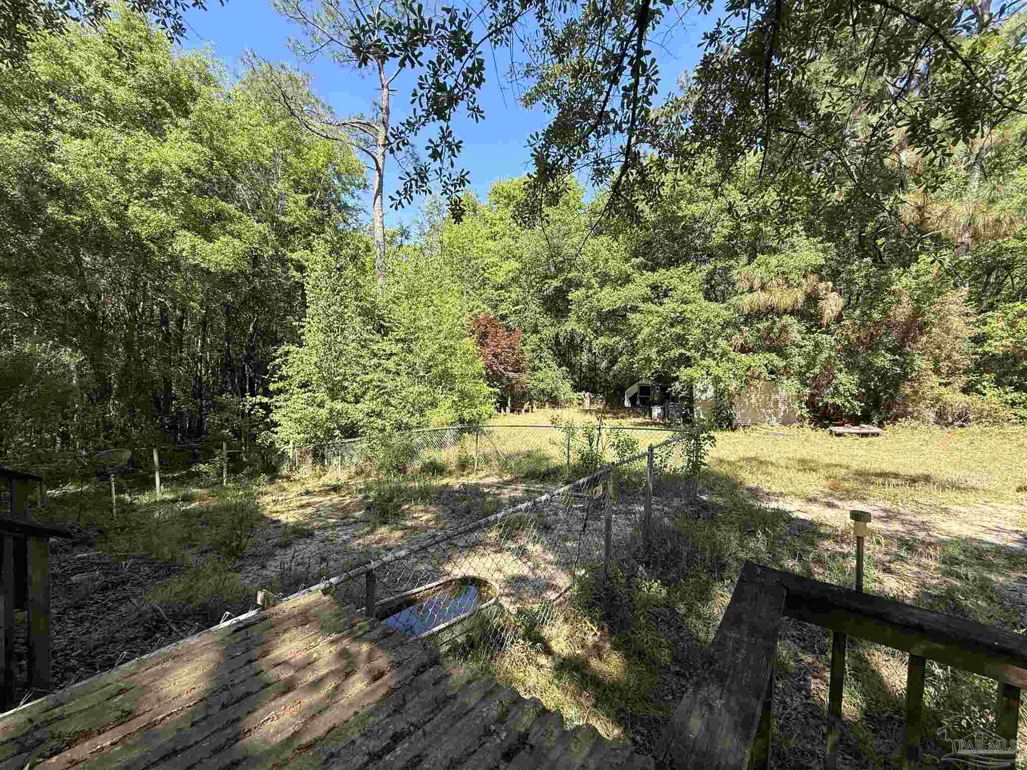 9543 Quiet Creek Road Milton, FL 32570 - Photo 10 of 45 a view of an outdoor space