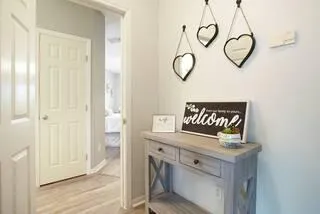 a view of a storage and utility room with a window