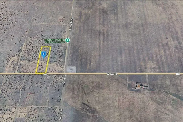 a view of a backyard of a house