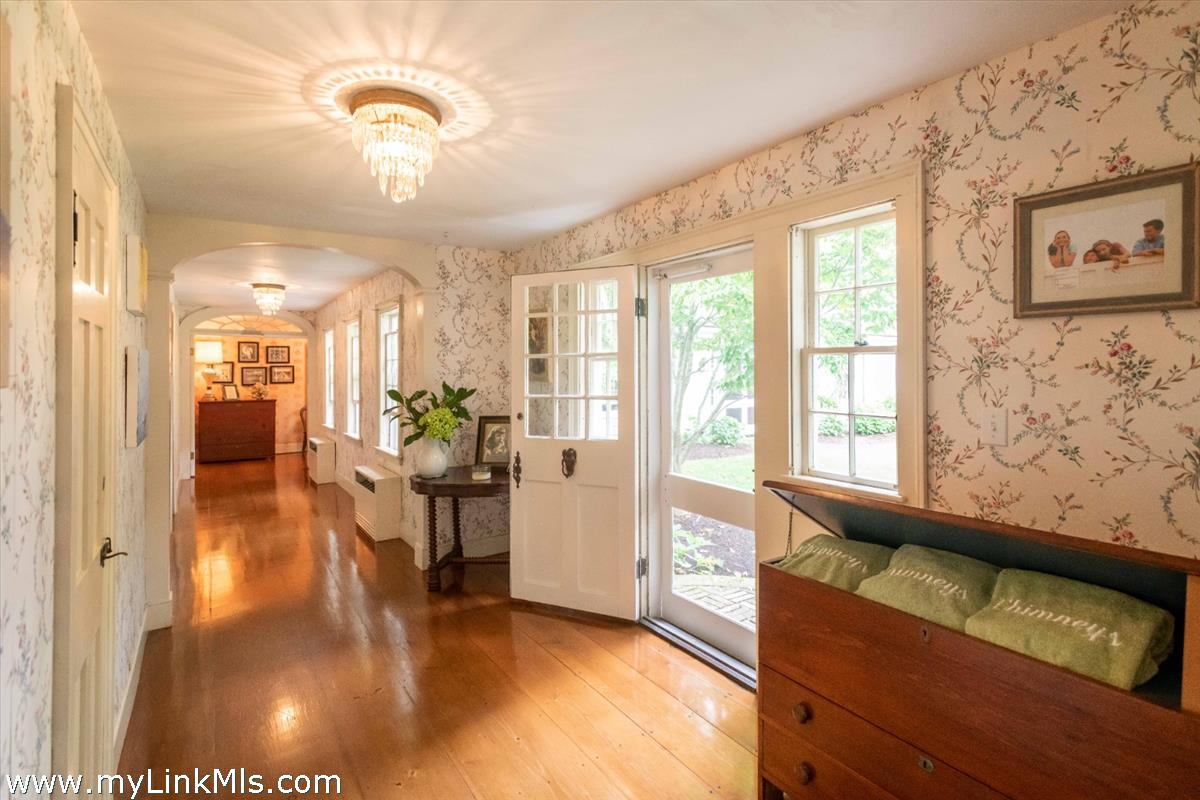 20 Main Street Nantucket, MA 02554 - Photo 12 of 33 a view of a living room and a chandelier