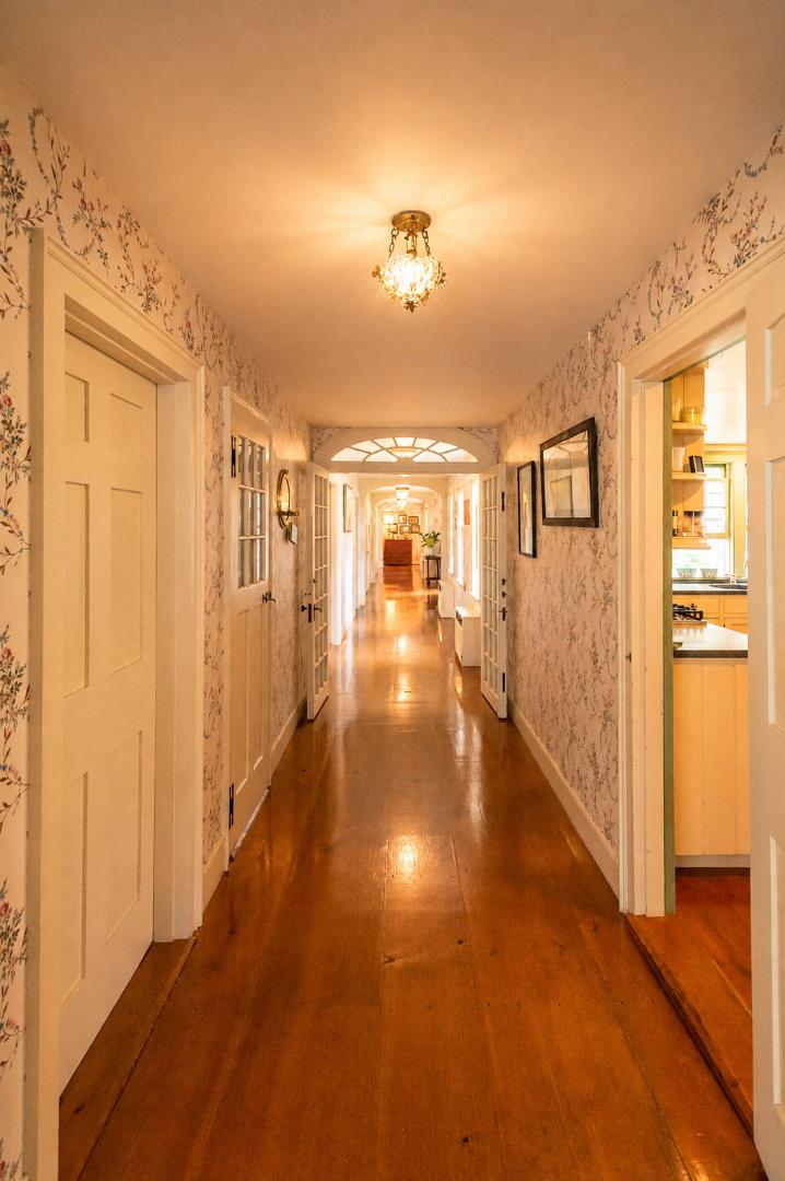 20 Main Street Nantucket, MA 02554 - Photo 13 of 33 a view of a hallway view with wooden floor and living room