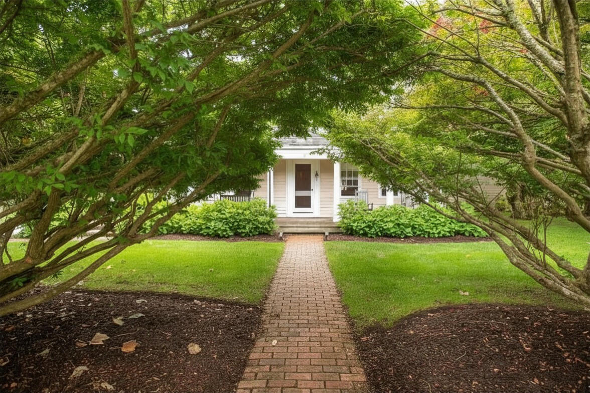 20 Main Street Nantucket, MA 02554 - Photo 25 of 33 a front view of a house with yard