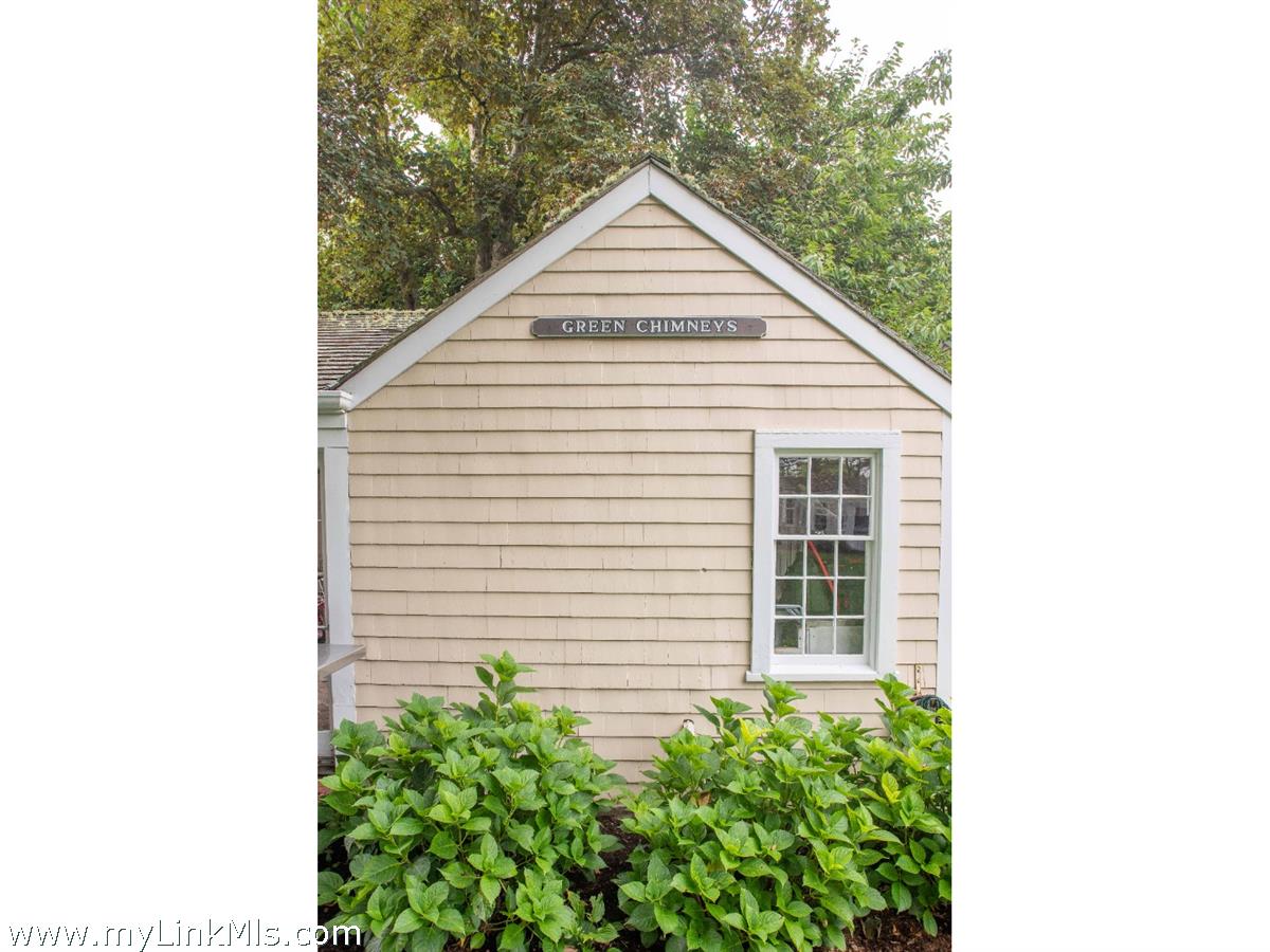 20 Main Street Nantucket, MA 02554 - Photo 10 of 33 a view of a house with a small yard