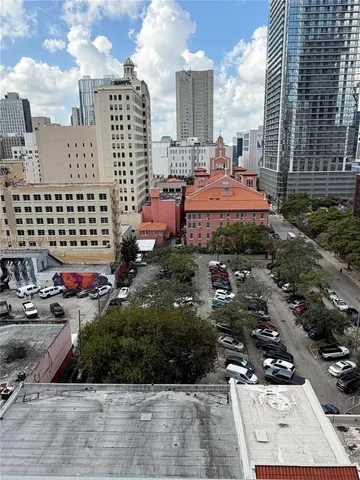 a view of a city with tall buildings