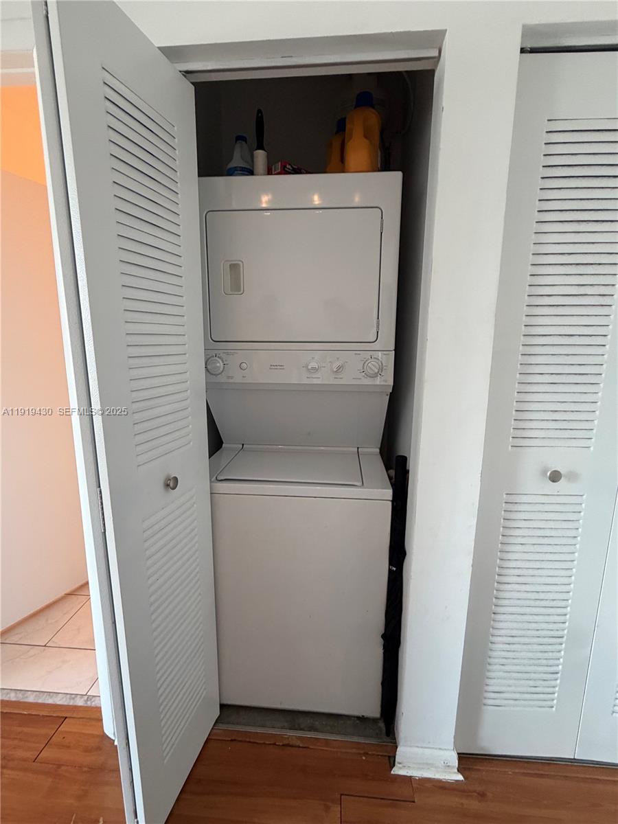 133 Northeast 2nd Avenue, Unit 1017 Miami, FL 33132 - Photo 4 of 14 a utility room with dryer and washer