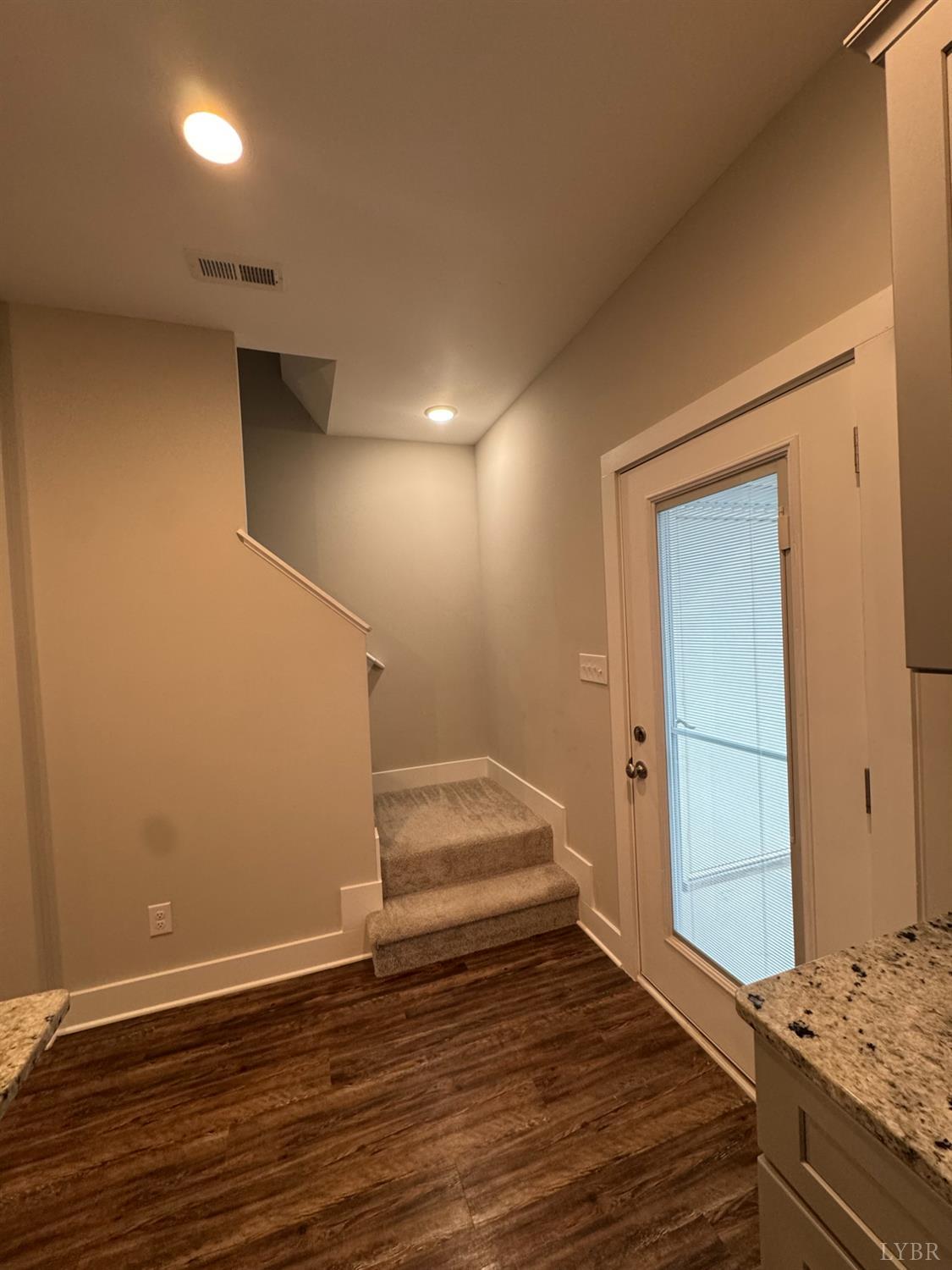 76 High Street Lynchburg, VA 24501 - Photo 11 of 22 a view of an empty room and wooden floor