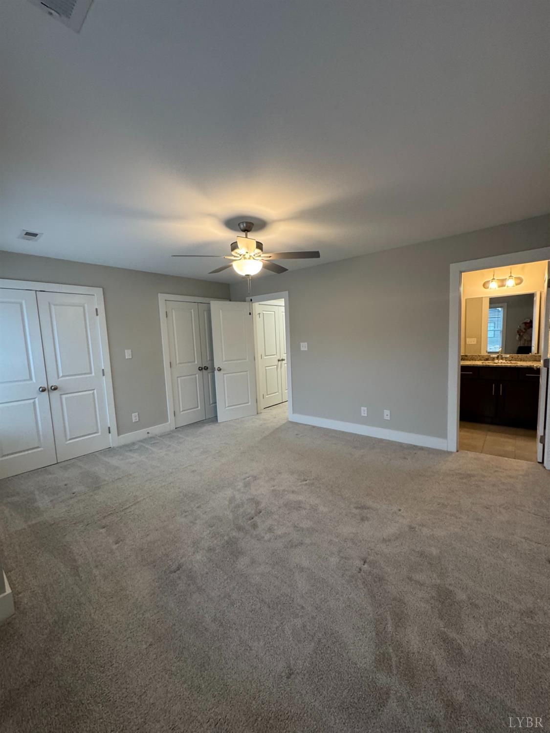 76 High Street Lynchburg, VA 24501 - Photo 14 of 22 a view of an empty room with a kitchen
