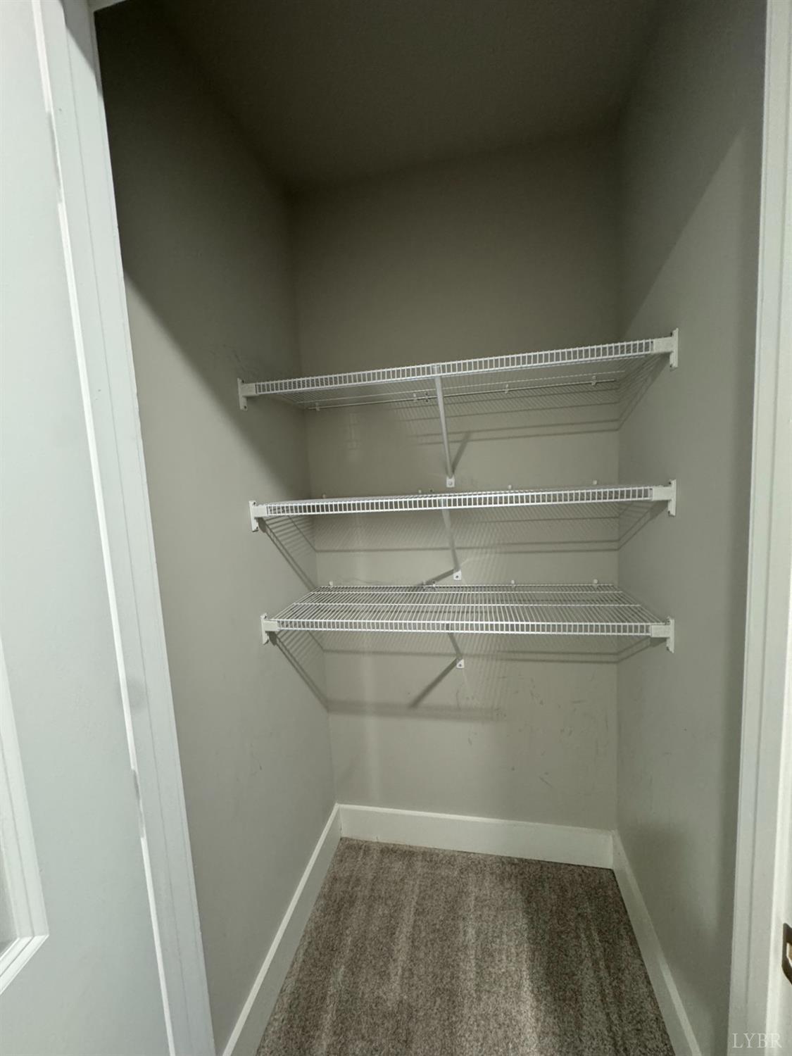 76 High Street Lynchburg, VA 24501 - Photo 21 of 22 a view of a room with racks on the wall