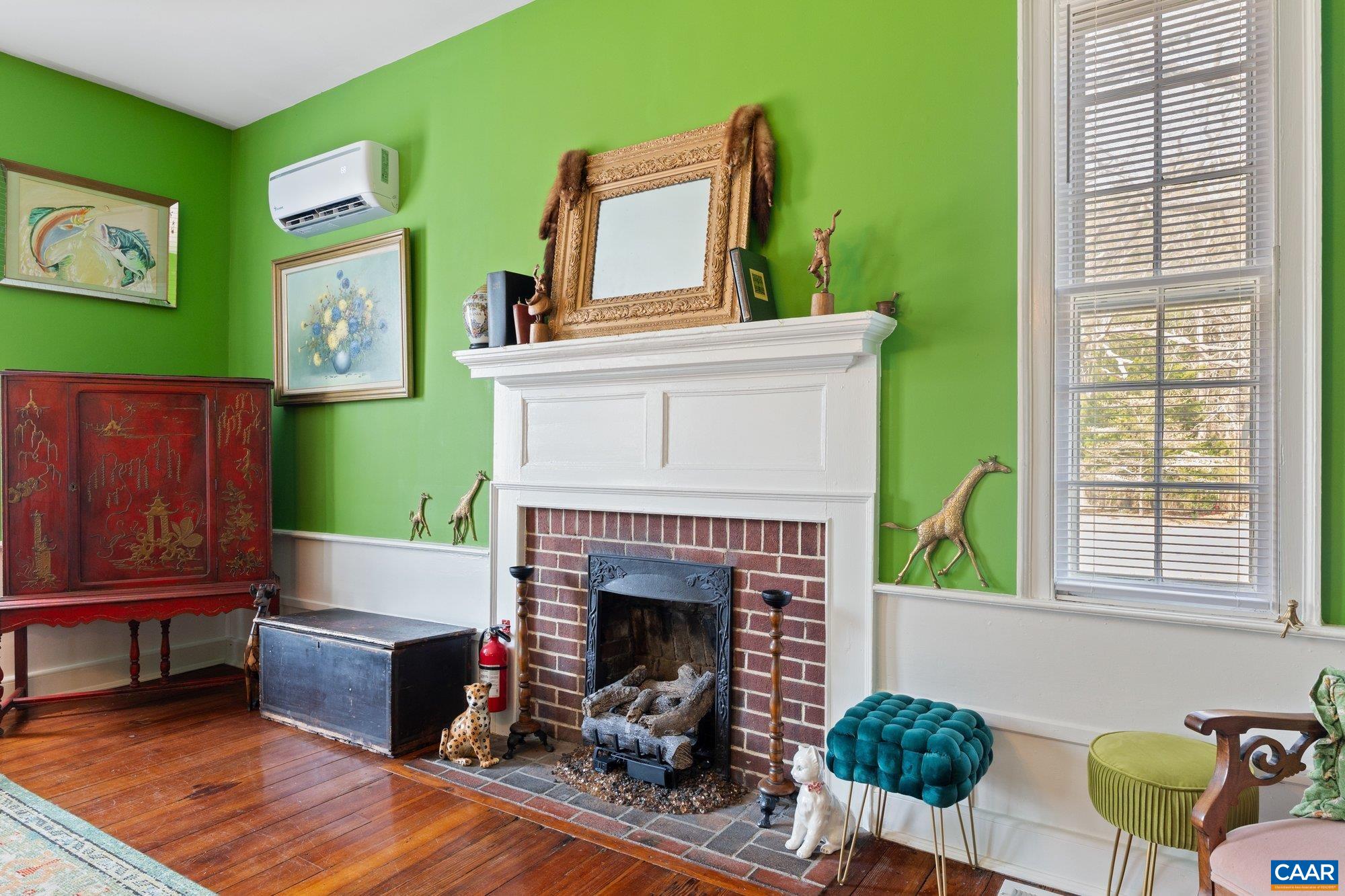 14910 Western Mill Road Lawrenceville, VA 23868 - Photo 24 of 73 a living room with furniture and a fireplace