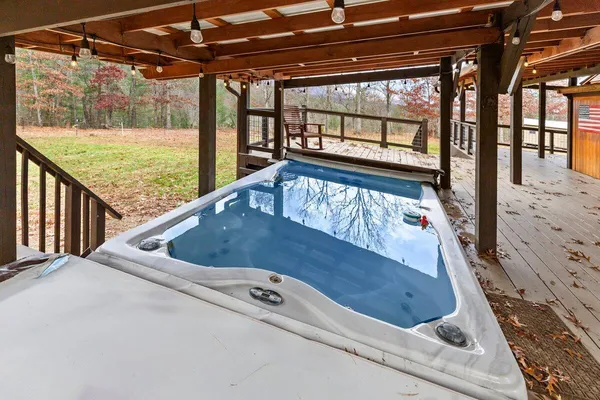 a view of a yard with swimming pool