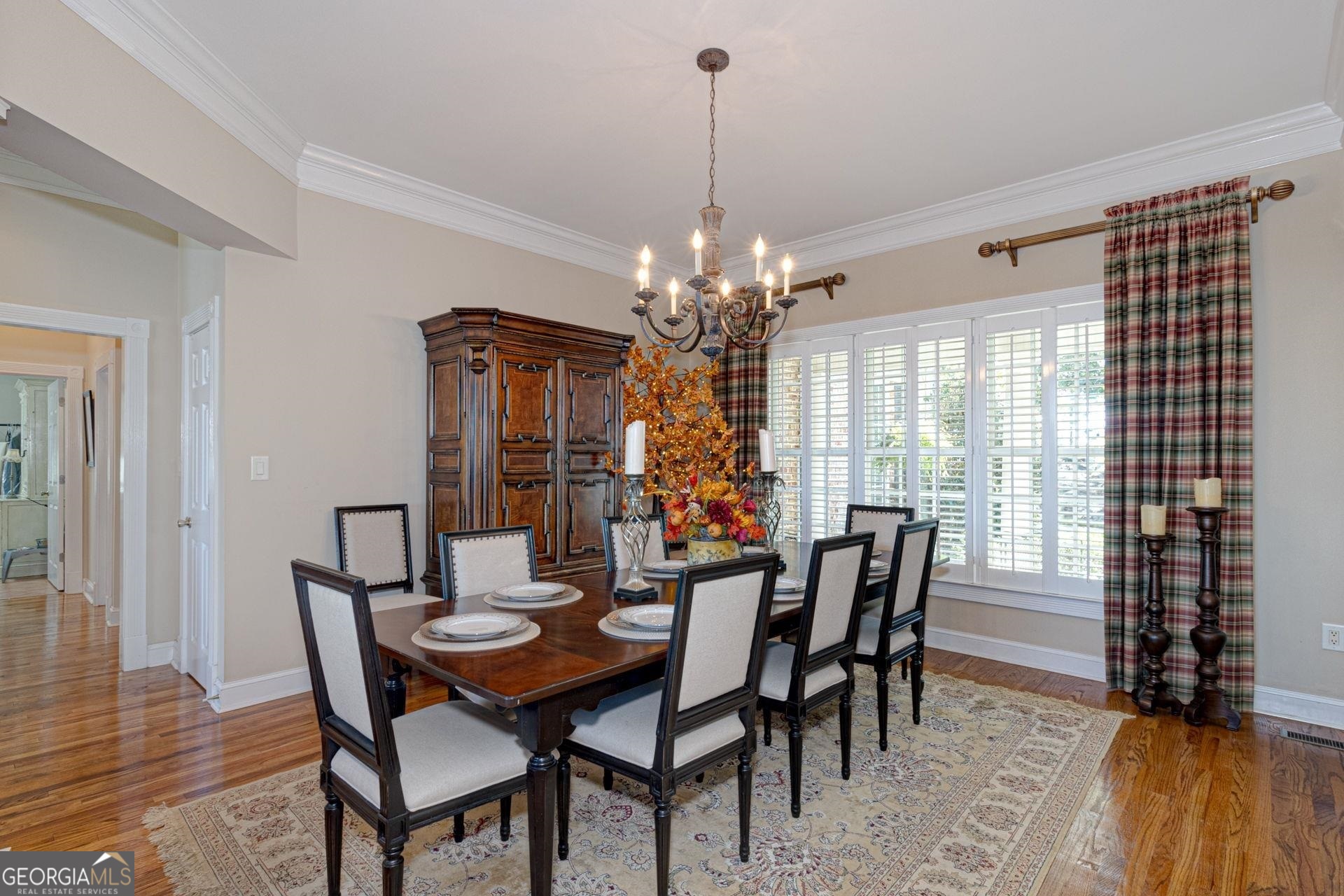 551 Mountain Ridge Drive Manchester, GA 31816 - Photo 8 of 72 Large upscale molding can be found in this room along with an elegant chandelier.