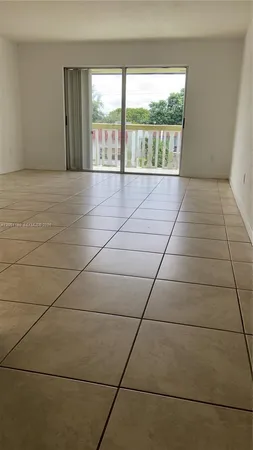 a view of a small house with wooden floor