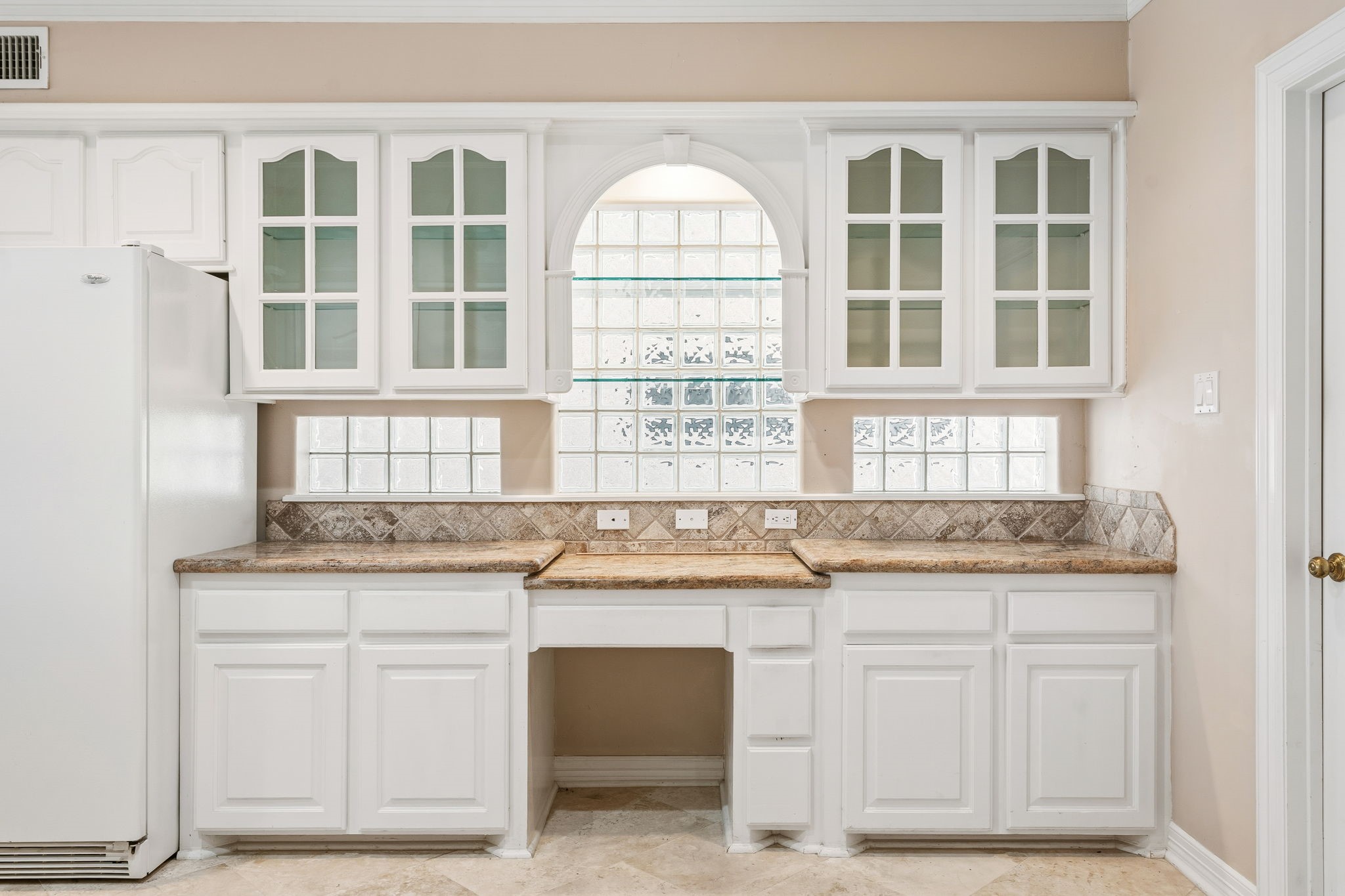 106 Cove Point Montgomery, TX 77356 - Photo 13 of 48 a view of granite countertop white cabinets and a granite counter tops