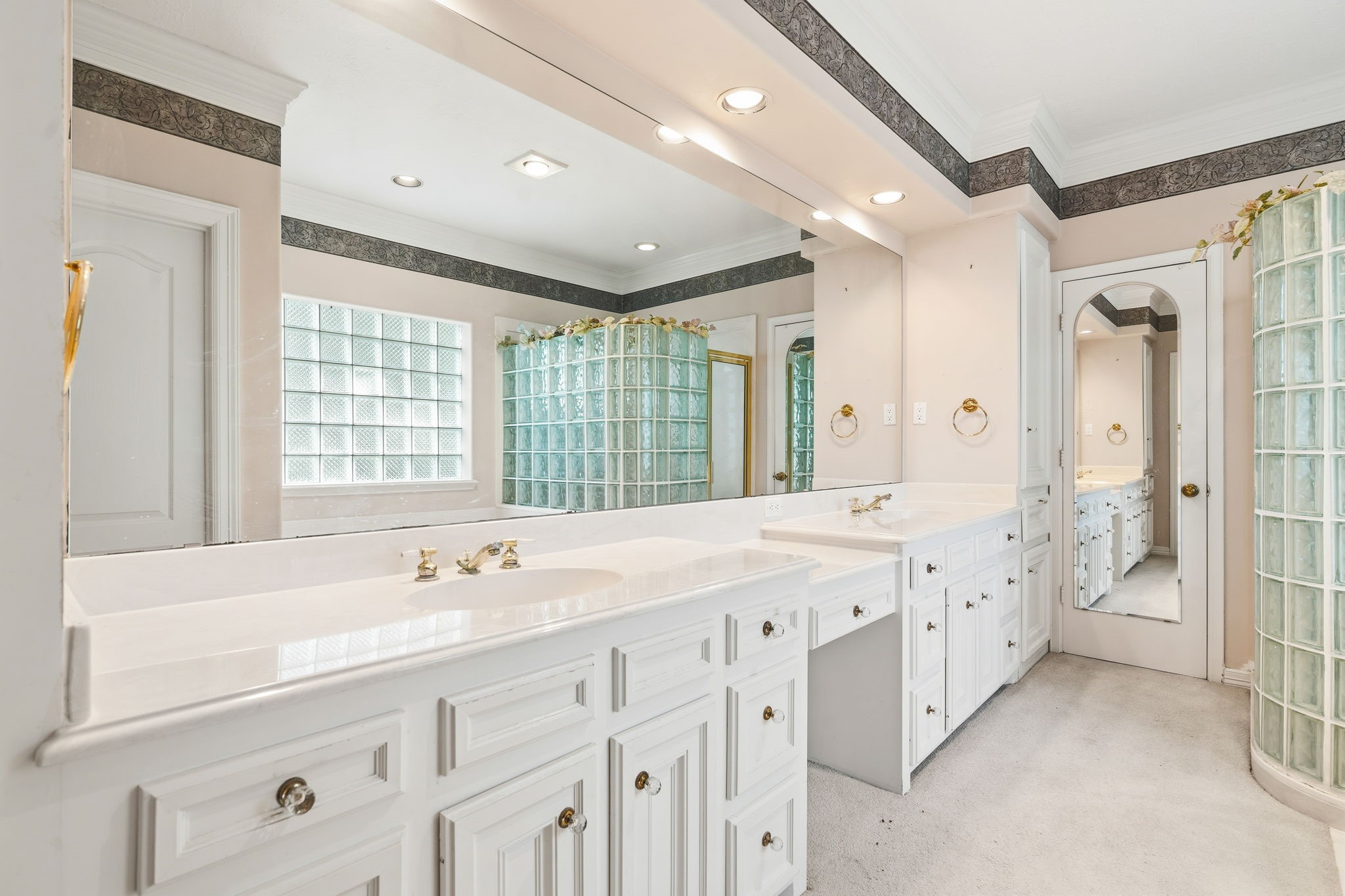 106 Cove Point Montgomery, TX 77356 - Photo 16 of 48 a spacious bathroom with double sink and a large mirror