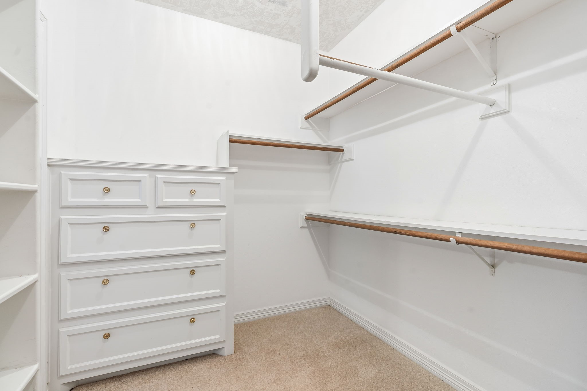 106 Cove Point Montgomery, TX 77356 - Photo 18 of 48 a view of an empty walk in closet