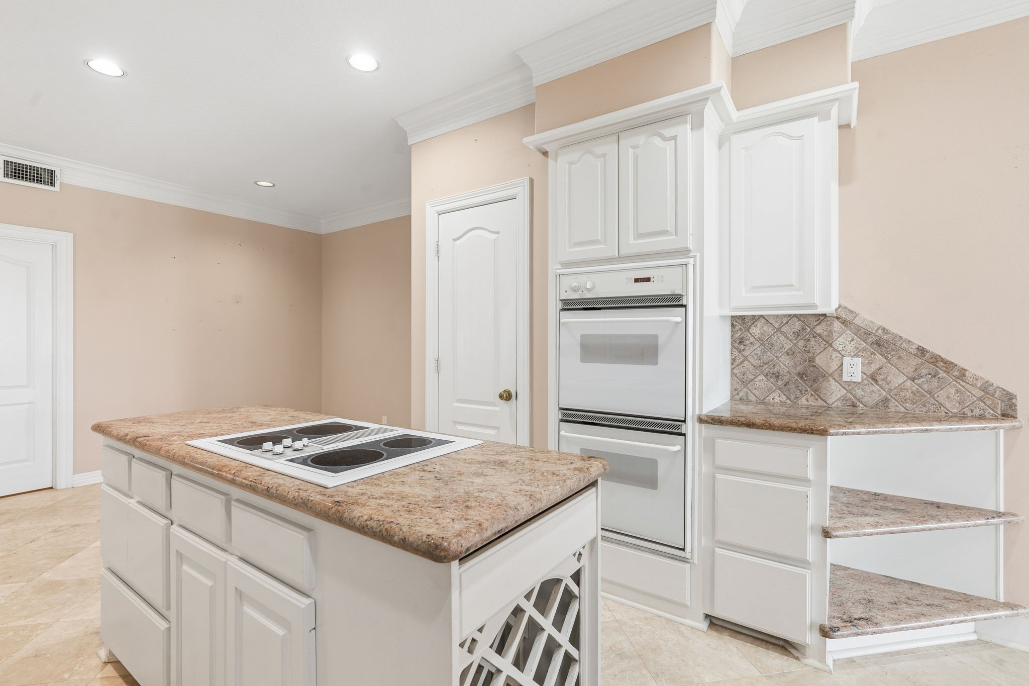 106 Cove Point Montgomery, TX 77356 - Photo 2 of 48 a kitchen that has a cabinets and a stove