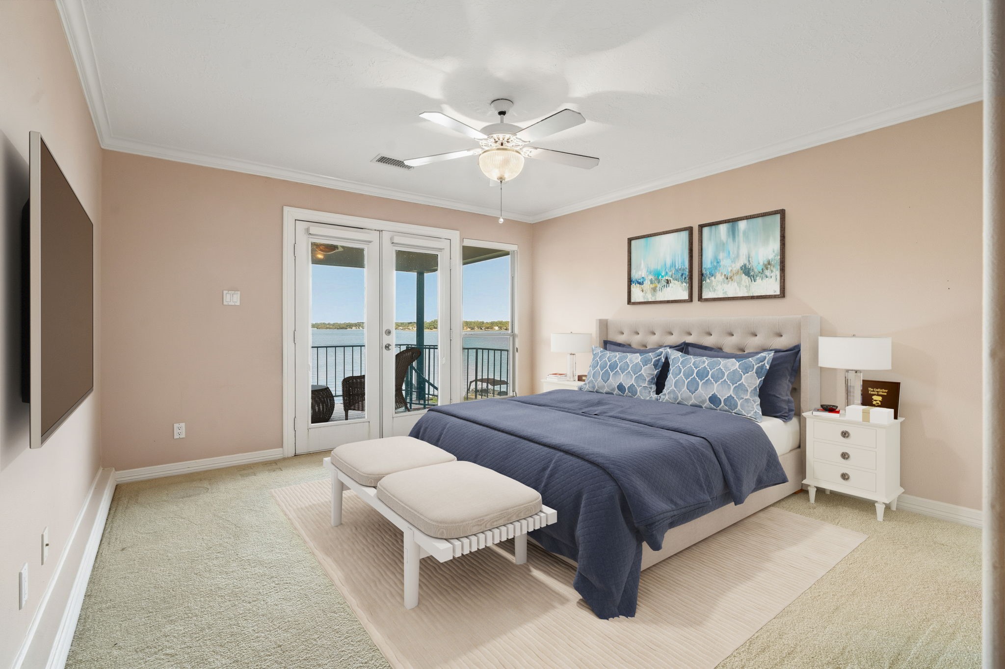 106 Cove Point Montgomery, TX 77356 - Photo 22 of 48 a spacious bedroom with a bed and a large window