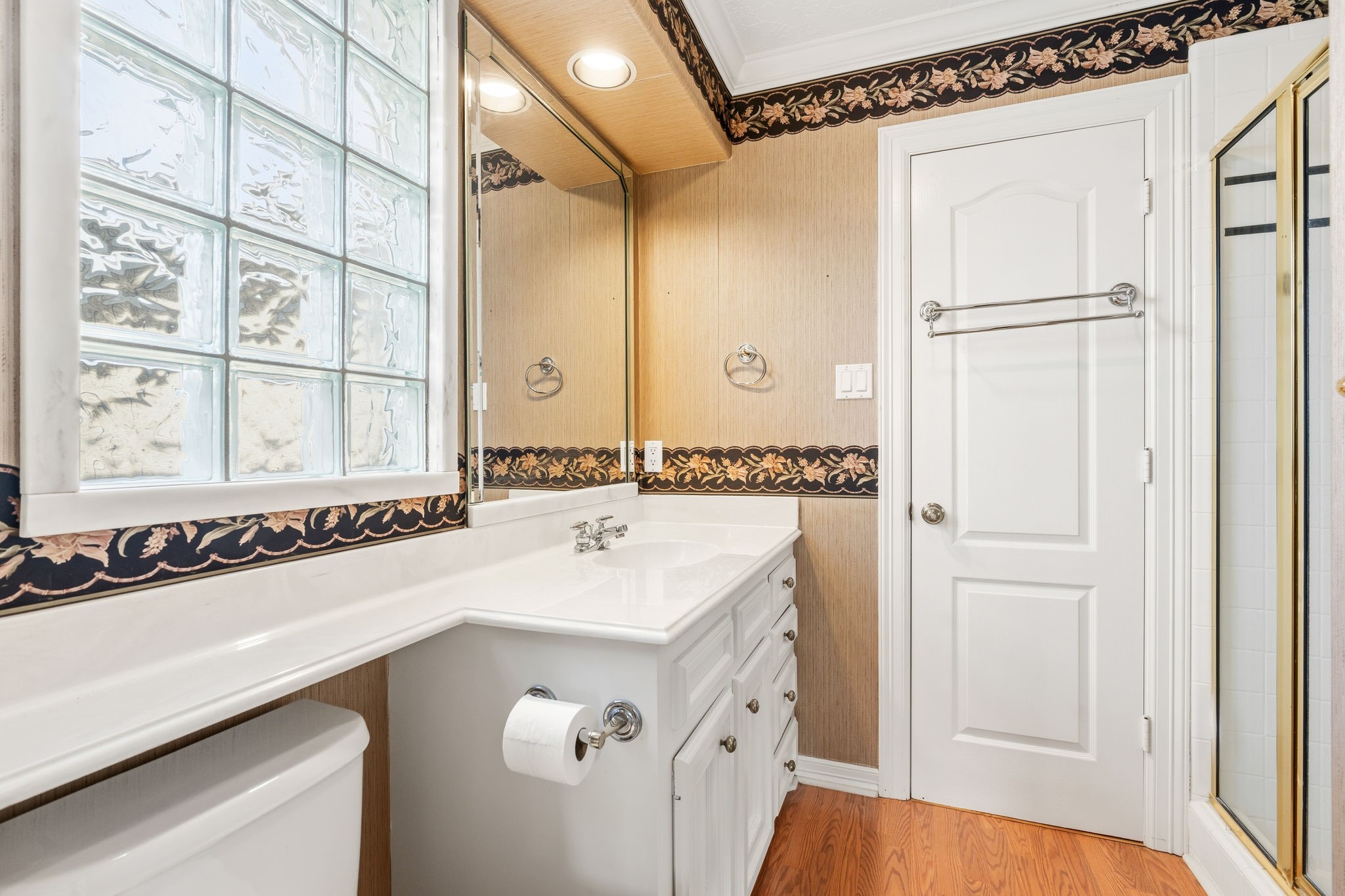 106 Cove Point Montgomery, TX 77356 - Photo 24 of 48 a bathroom with a sink a mirror and a shower
