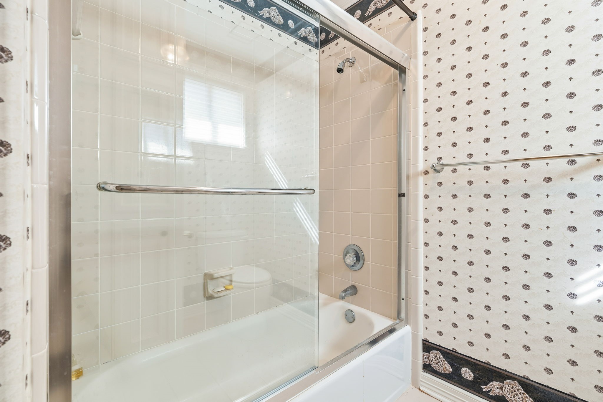 106 Cove Point Montgomery, TX 77356 - Photo 27 of 48 a bathroom with a bathtub and shower