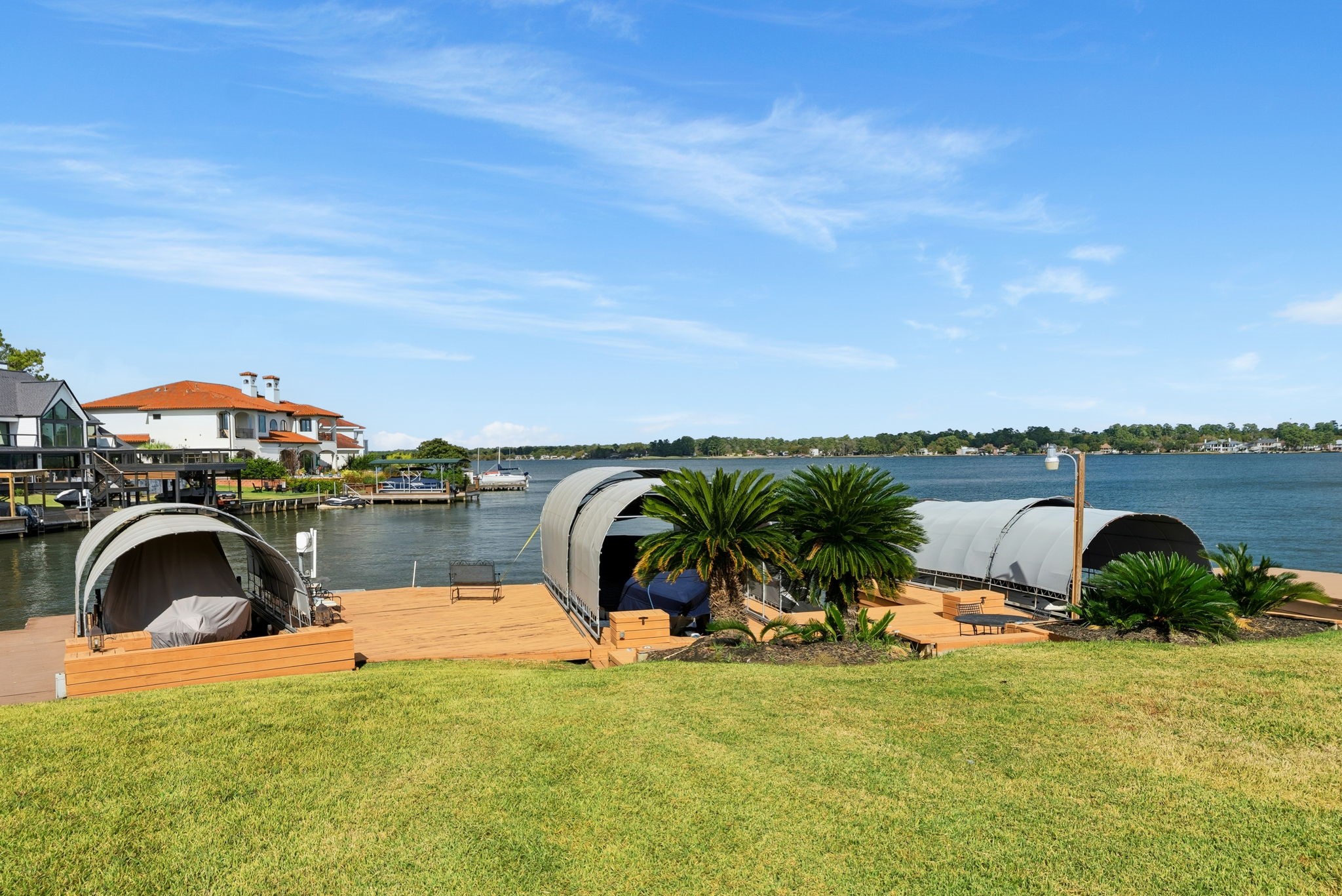 106 Cove Point Montgomery, TX 77356 - Photo 34 of 48 a view of a swimming pool and a yard