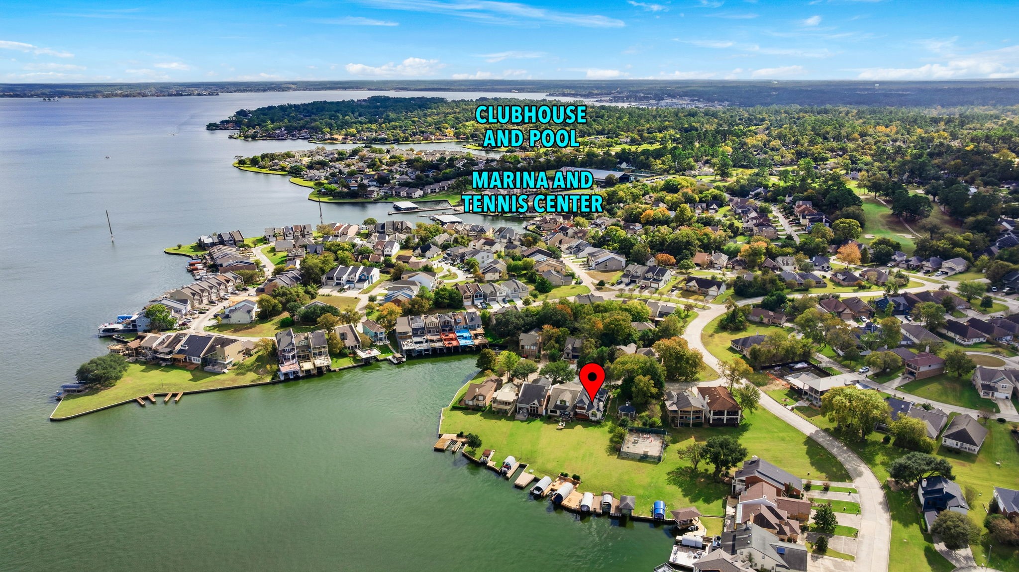 106 Cove Point Montgomery, TX 77356 - Photo 38 of 48 a view of a lake with a house