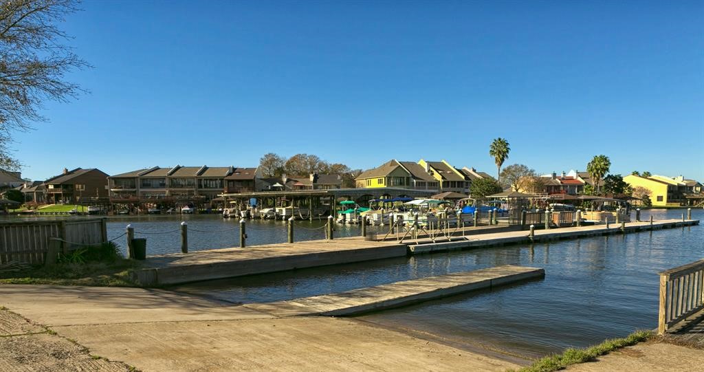 106 Cove Point Montgomery, TX 77356 - Photo 47 of 48 a view of a lake with a mountain