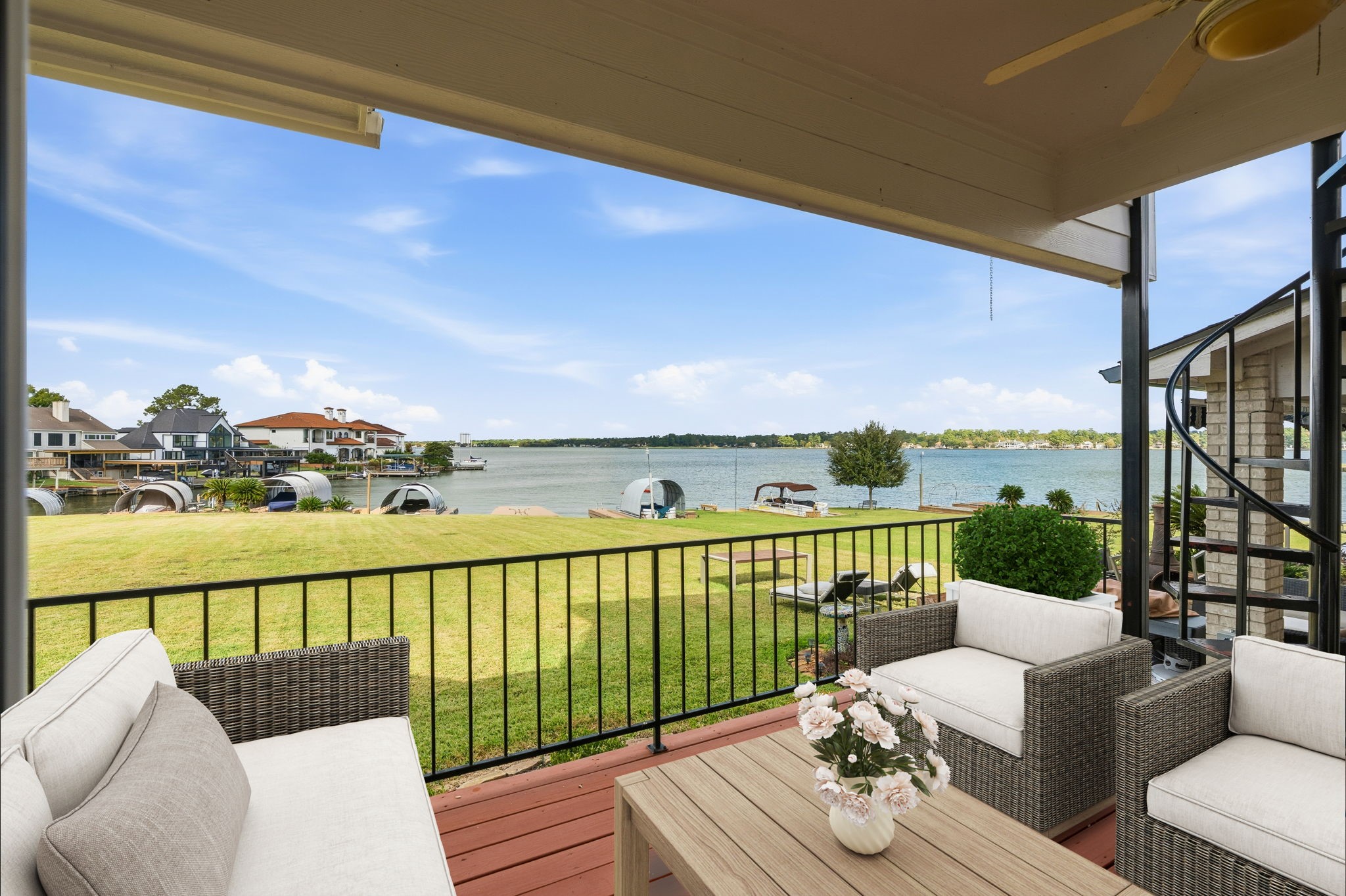 106 Cove Point Montgomery, TX 77356 - Photo 8 of 48 a view of balcony with couch and wooden floor