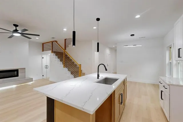 a view of a chair and table in the backyard