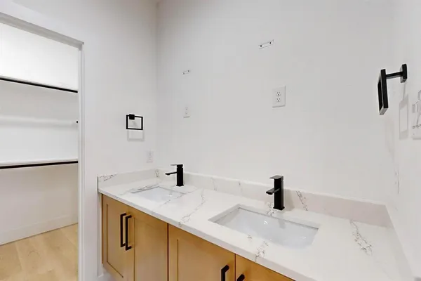 a bathroom with a shower and toilet