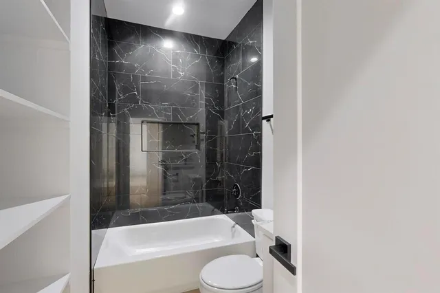 an empty room with window and windows