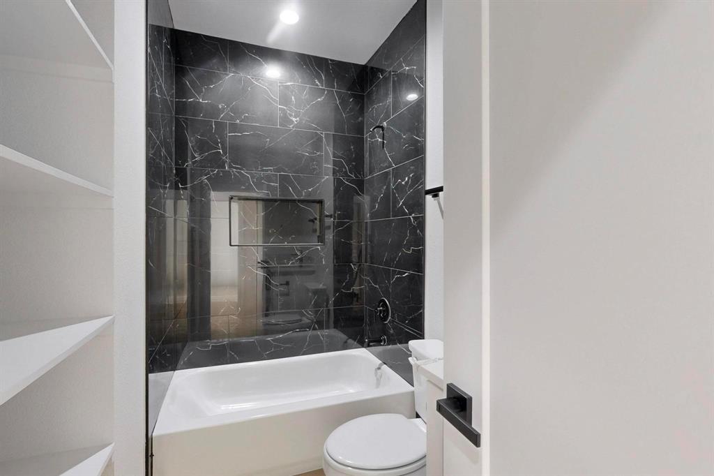 4515 Wahoo Street Dallas, TX 75210 - Photo 21 of 36 Full bath with bathing tub / shower combination and vanity