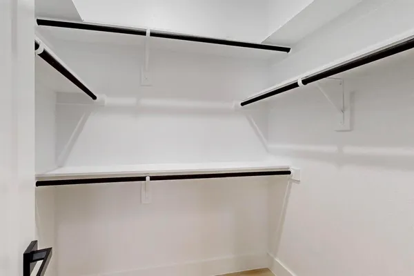 a view of room with window and ceiling fan