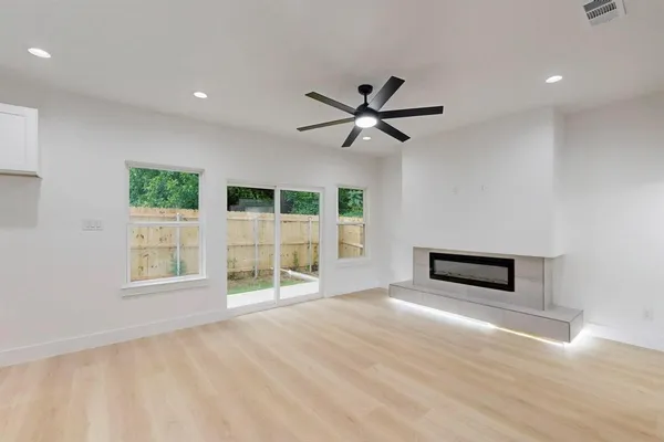 a view of an empty room with a window