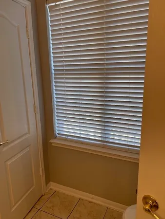 a view of a room that has a window in it