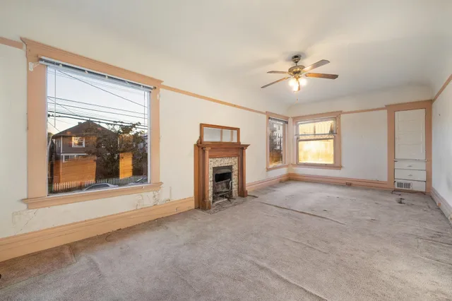 a view of a living room and window