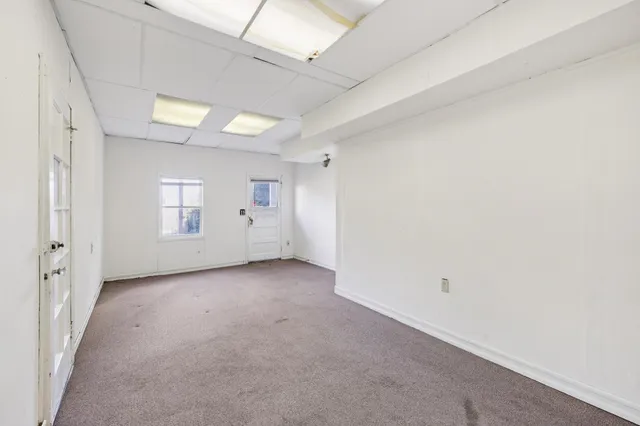 a view of a backyard with a garden