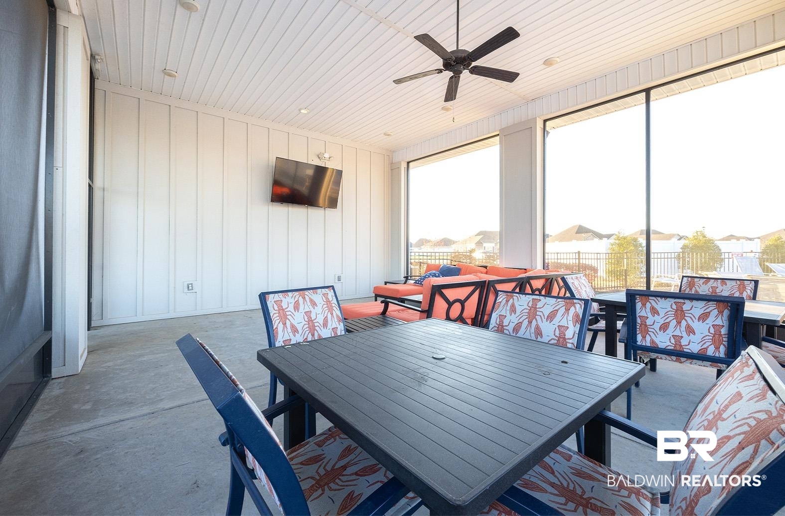 11044 Native Dancer Way Daphne, AL 36526 - Photo 65 of 67 Dining area with concrete flooring, ceiling fan, and wood ceiling
