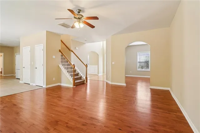 a kitchen with stainless steel appliances granite countertop a sink and a stove