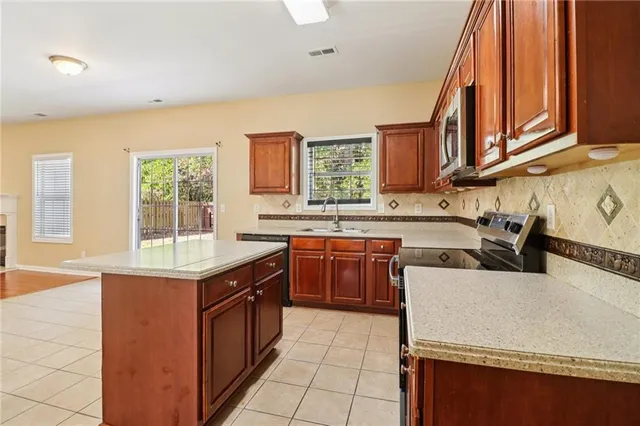 an empty room with closet area