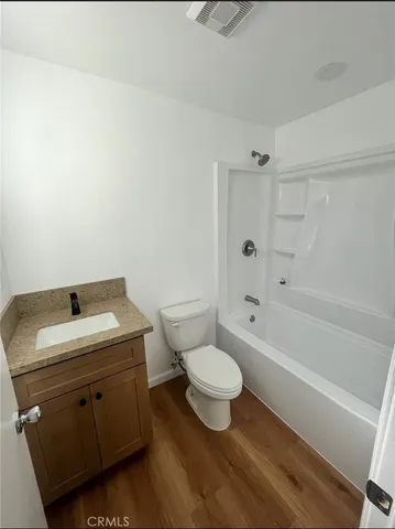 a bathroom with a sink toilet a bathtub and a shower